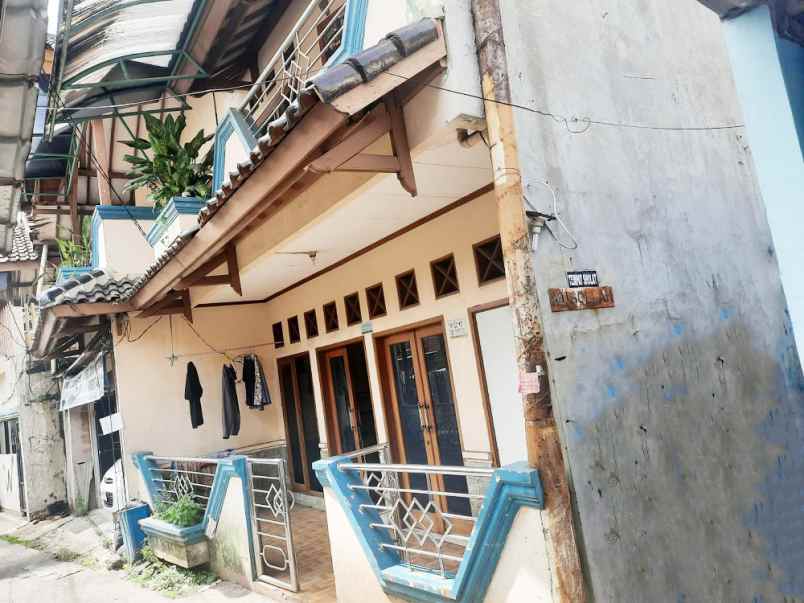 dijual rumah jl kopo no 17 kel beji kec