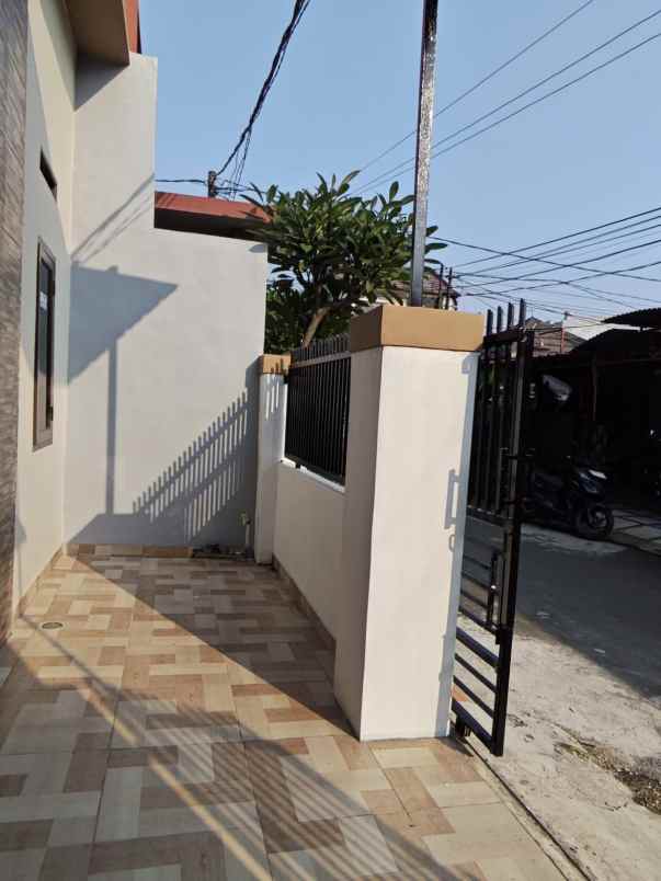 dijual rumah pondok ungu permai cluster