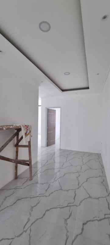 over kredit 45juta rumah 2 lantai taman asri cibinong