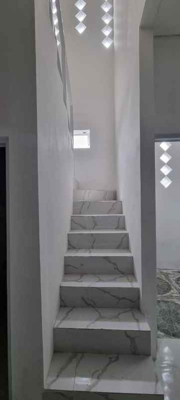 over kredit 45juta rumah 2 lantai taman asri cibinong