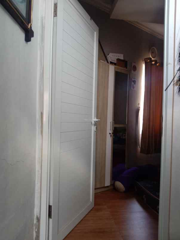 rumah belakang kampus jgu dekat grand depok city