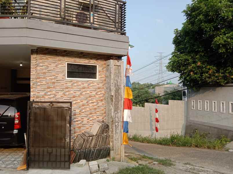 rumah belakang kampus jgu dekat grand depok city