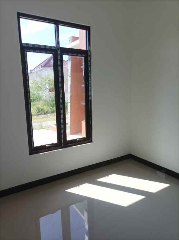 rumah jln ahmad yani timur kp