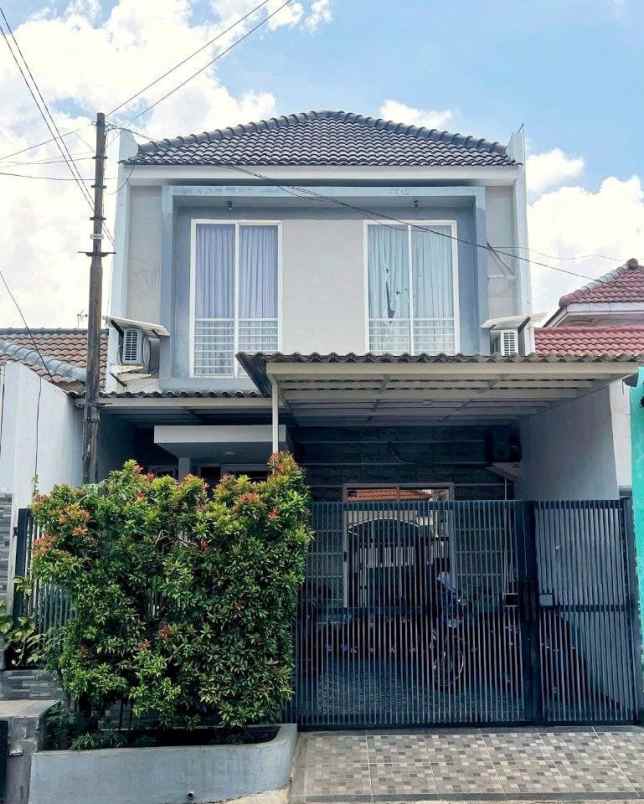 rumah pantai mentari minimalis carport row 3 mobil