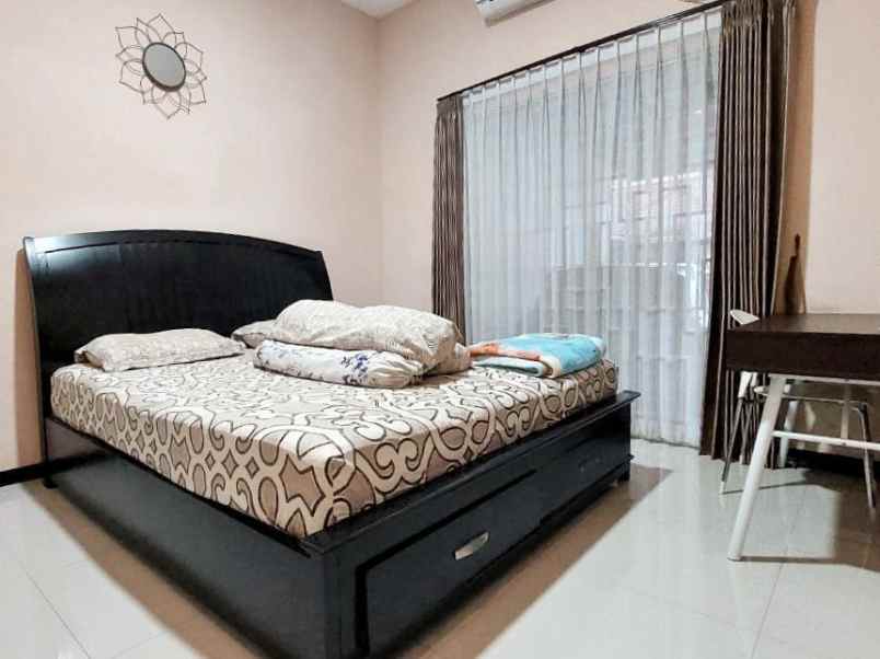 rumah pantai mentari minimalis carport row 3 mobil