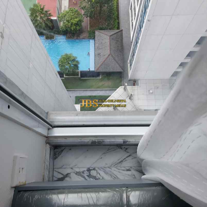 dijual apartemen tribeca condominium