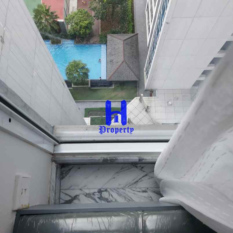 dijual apartemen tribeca condominium
