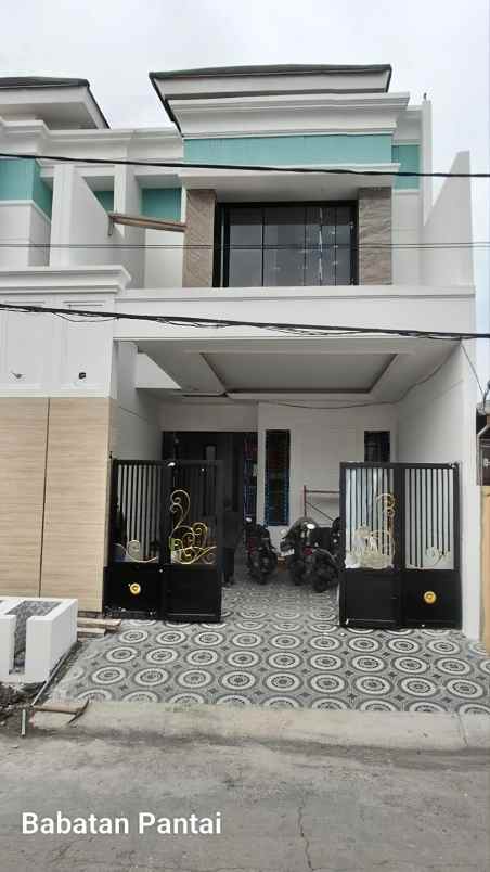 dijual rumah babatan pantai