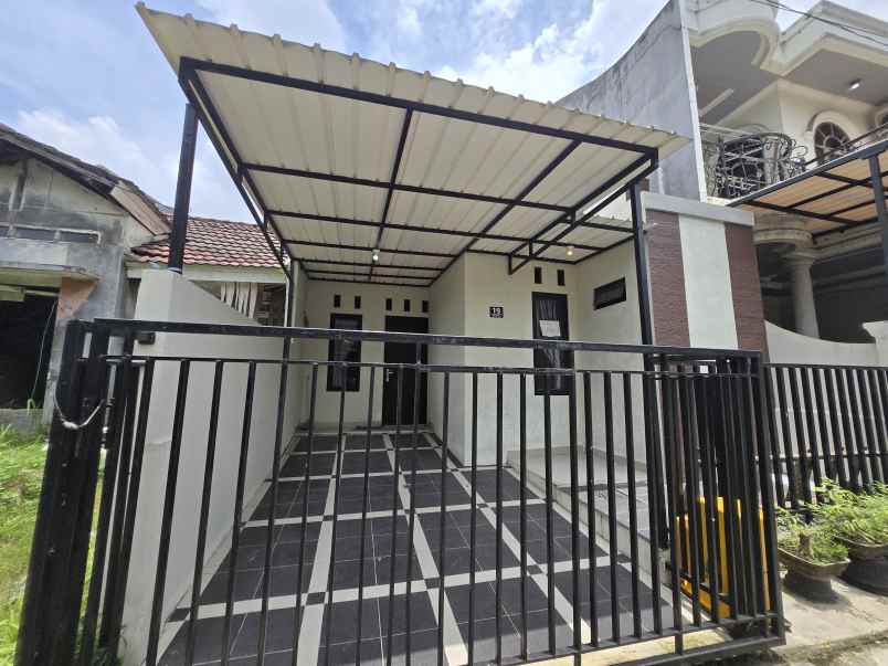 dijual rumah cluster graha indira citra raya tangerang