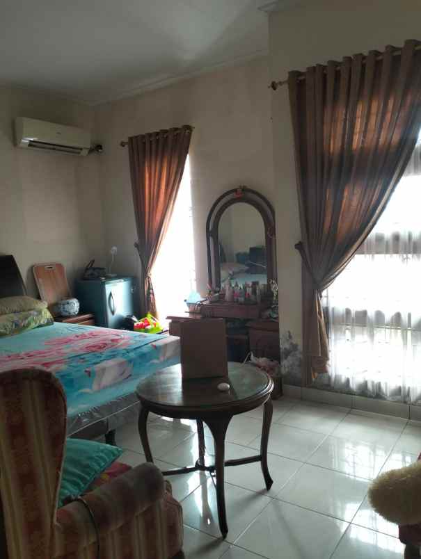 dijual rumah cluster harmoni harapan indah