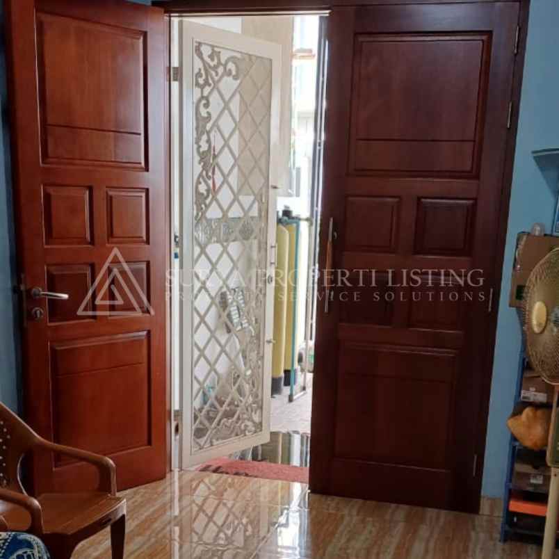 dijual rumah jalan graha metropolitan