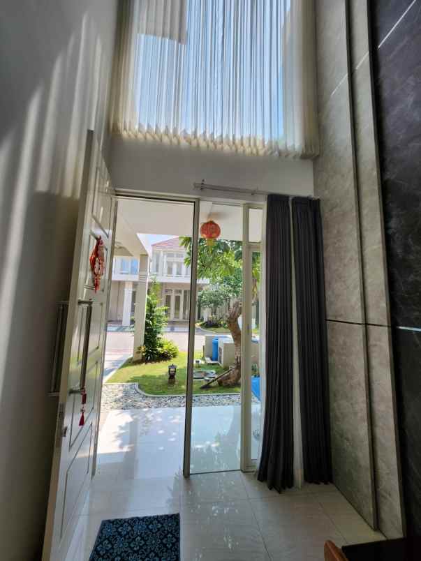 dijual rumah jalan grand pakuwon