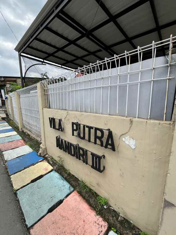 dijual rumah jl raya raden sanim