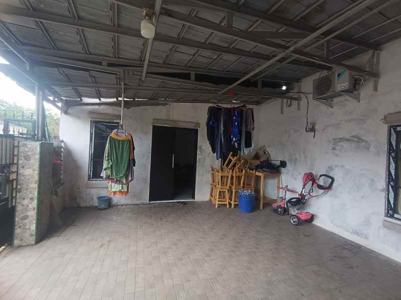 dijual rumah kampung kawaron suvarna sutera