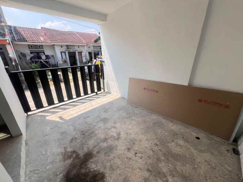 dijual rumah perumahan taman firdaus