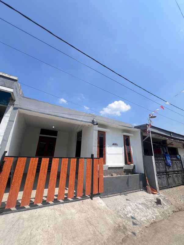 dijual rumah perumahan taman firdaus