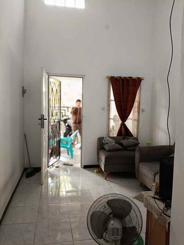 dijual rumah taman harapan baru