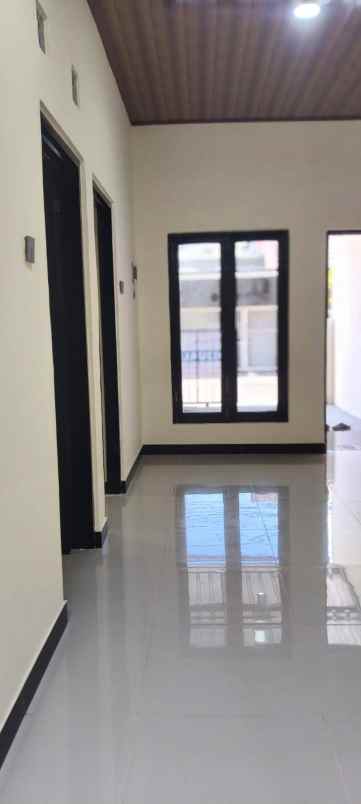 dijual rumah wiguna