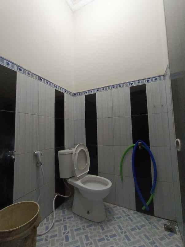 disewakan rumah kota harapan indah bekasi