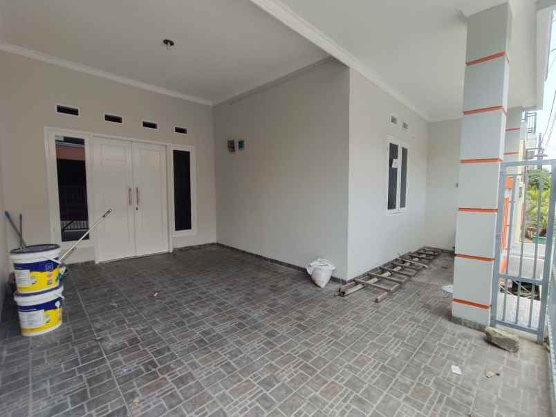 disewakan rumah kota harapan indah bekasi