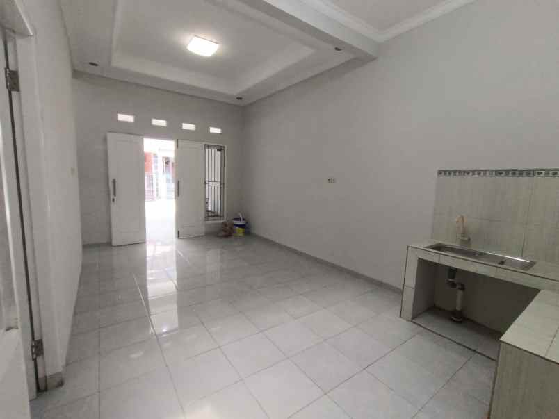 disewakan rumah kota harapan indah bekasi