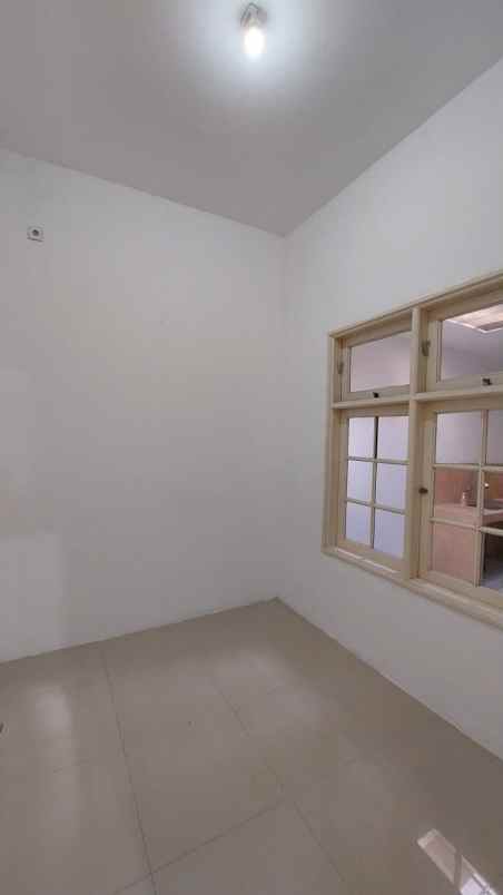 disewakan rumah pantai mentari