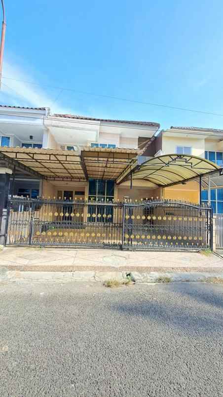 disewakan rumah taman modern