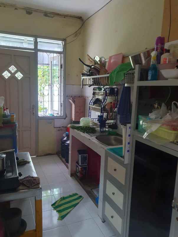 rumah dijual taman puspa raya citraland surabaya barat