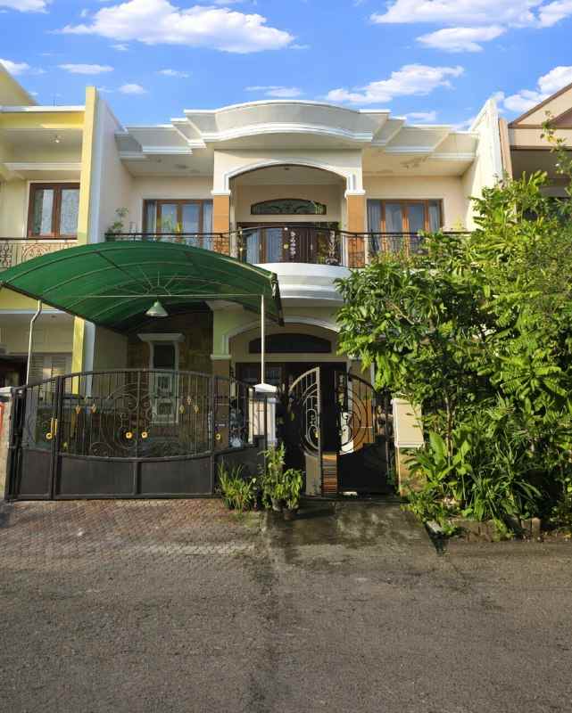 rumah taman mutiara pakuwon city strategis siap huni