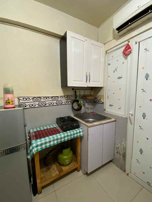 sewa apartment green pramuka city pertahun