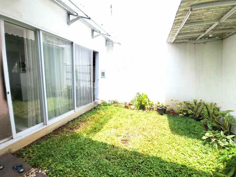 dijual rumah cluster aralia harapan