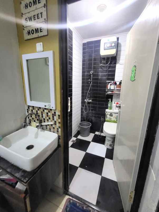 dijual rumah cluster aralia harapan