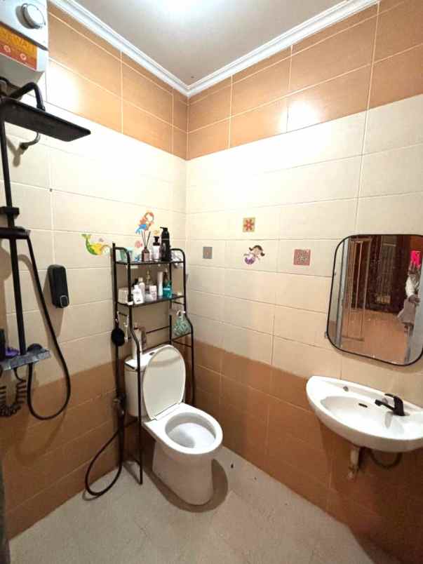 dijual rumah cluster aralia harapan