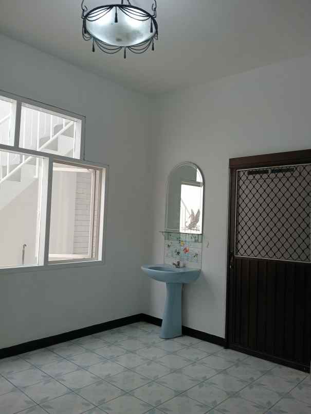 dijual rumah dharmahusada indah