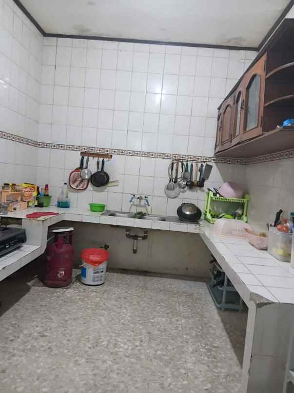 dijual rumah jalan dharmahusada indah