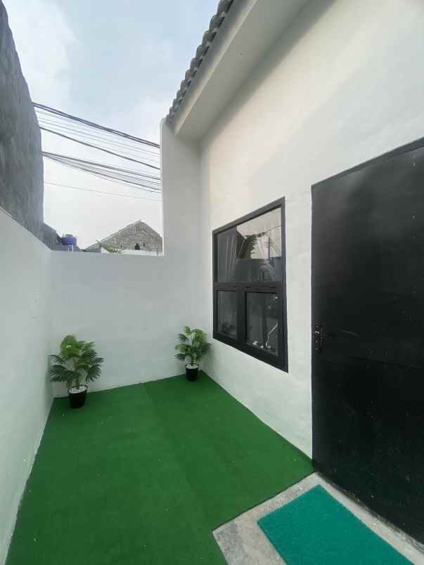 dijual rumah jalan raya megu cisoka