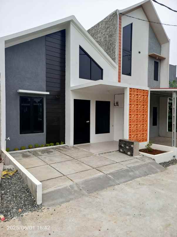 dijual rumah jl raya kalimulya