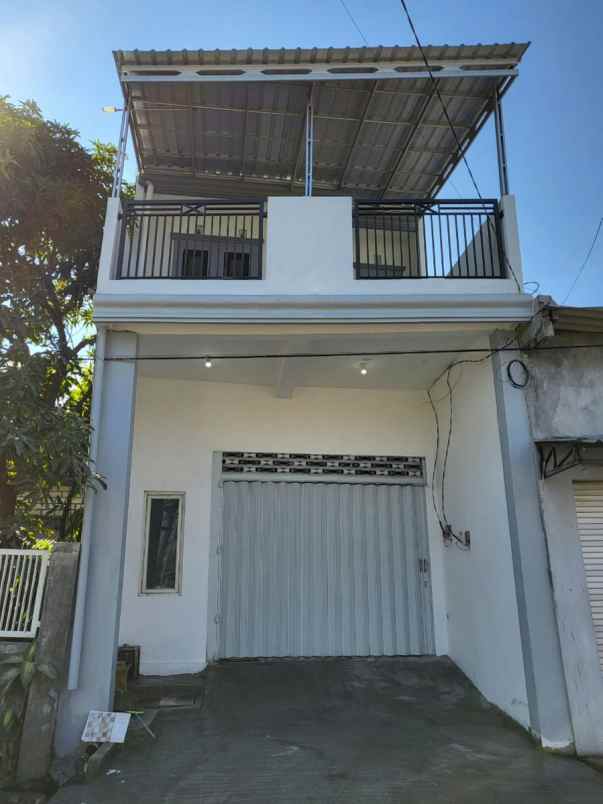 dijual rumah jln raya medokan ayu