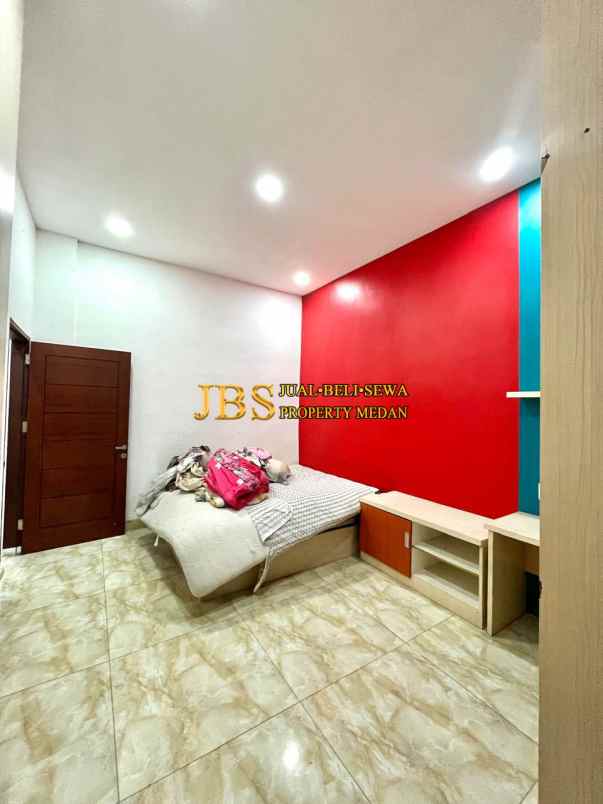 dijual rumah komplek graha metropolitan