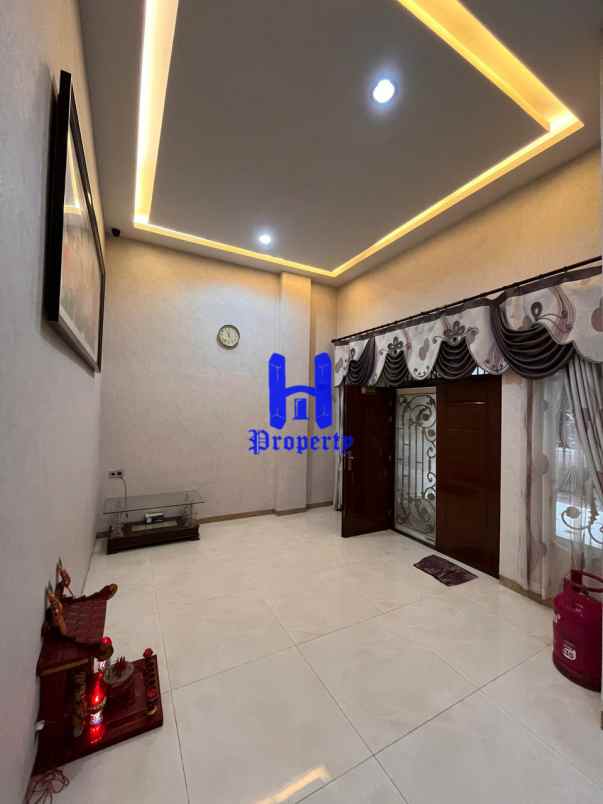 dijual rumah komplek makmur garden