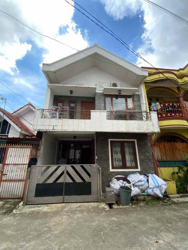 dijual rumah taman harapan baru