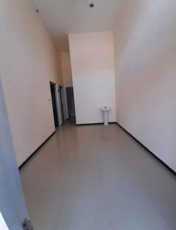 disewakan rumah pantai mentari