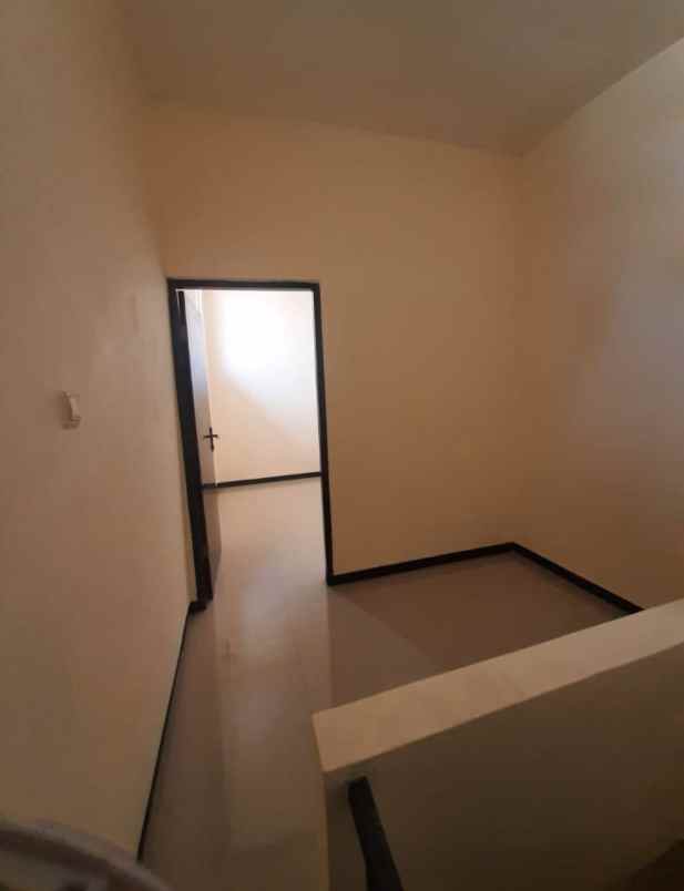 disewakan rumah pantai mentari