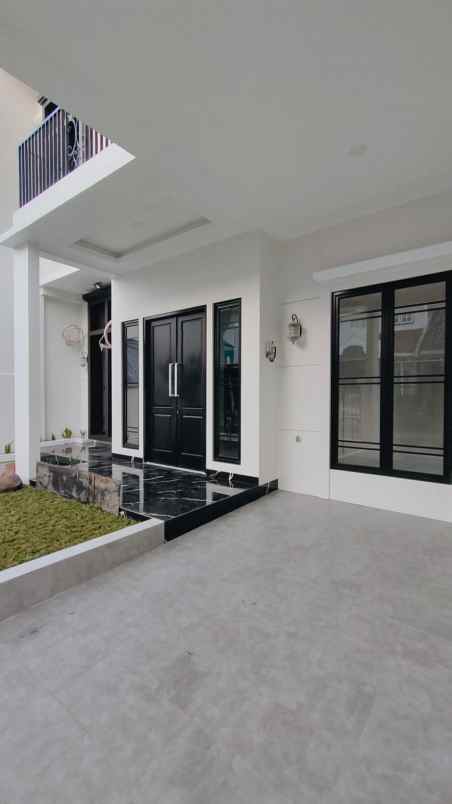rasain hidup tenang di rumah modern kencana loka bsd