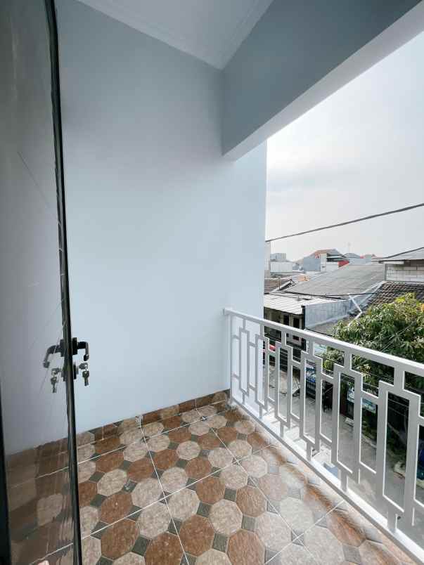 rumah 2 lantai cantik dalam cluster bisa di kpr di pup