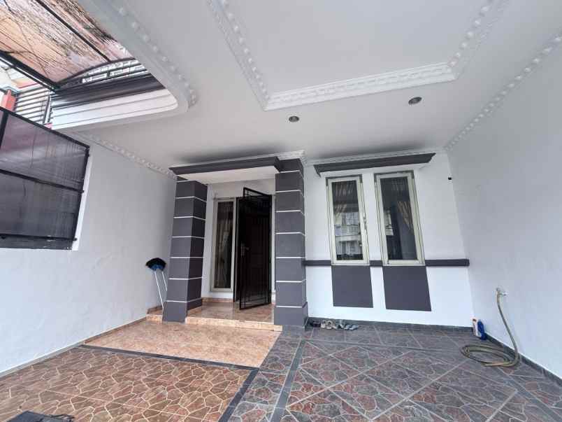 rumah cluster taman puspa kota harapan indah bekasi