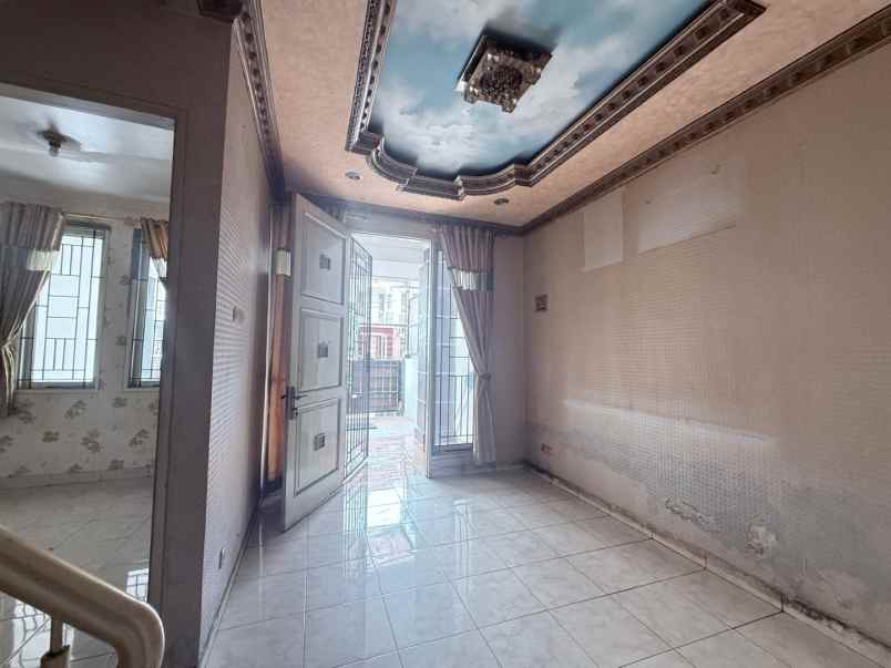 rumah cluster taman puspa kota harapan indah bekasi