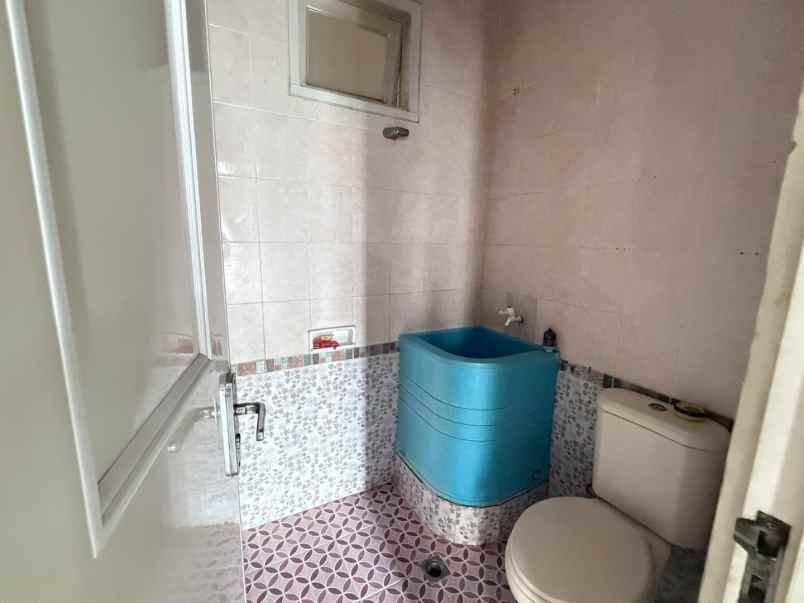 rumah cluster taman puspa kota harapan indah bekasi