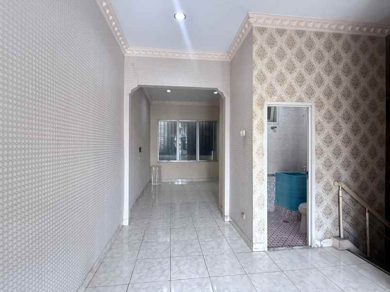 rumah cluster taman puspa kota harapan indah bekasi