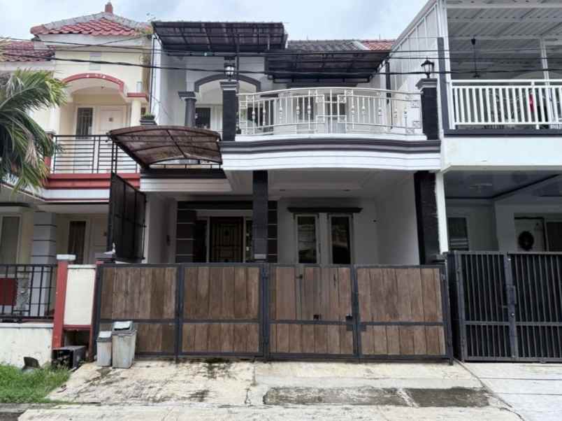 rumah cluster taman puspa kota harapan indah bekasi